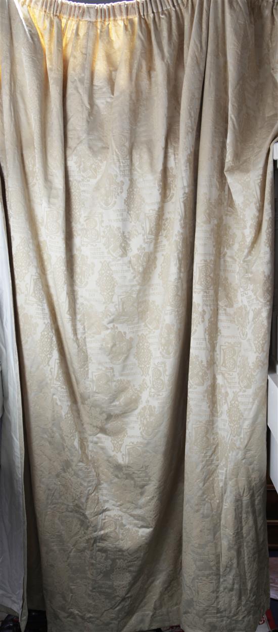 A pair of cream tapestry style fabric curtains, W.15ft 4in. Drop 1ft 10in.